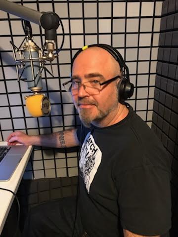 Photo of Michael Capra in vocal booth